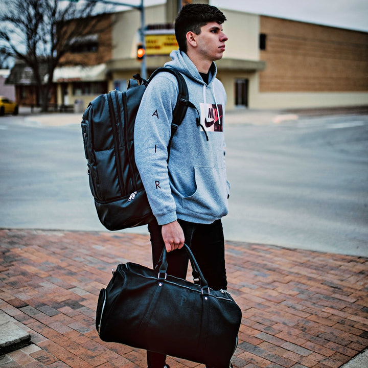 Sole Premise Black Leather Luxury Carry On Backpack Patented Signature Design